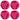 Four pink roller hockey pucks with black studs on a white background